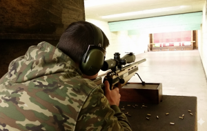 Precision shooting session focusing on firearm safety and handling