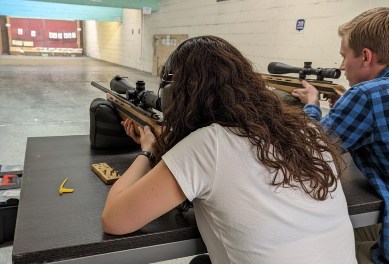 Precision shooting session focusing on firearm safety and handling